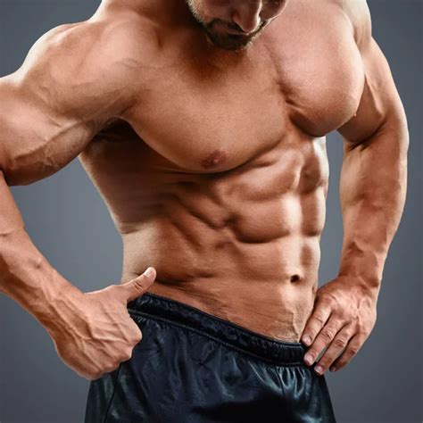 Bodybuilder Man Showing His Abs Stock Photo By Kegfire