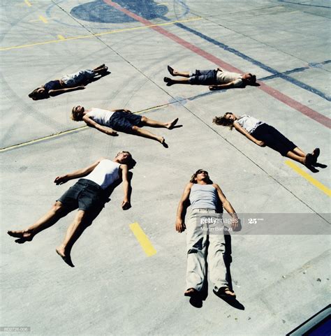 Stock Photo Group Of Young People Lying On Ground Elevated View