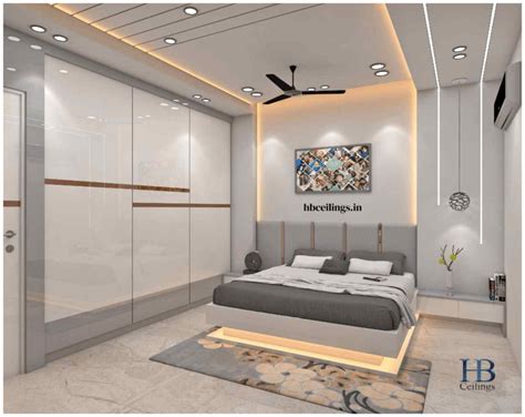 Simple False Ceiling Design For Living Room With 2 Fa