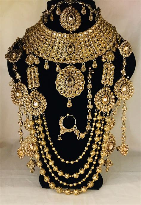 Harita Antique gold polki 8 piece bridal jewellery