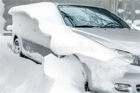 Car On A Street Covered With Big Snow Layer Stock Image Image Of