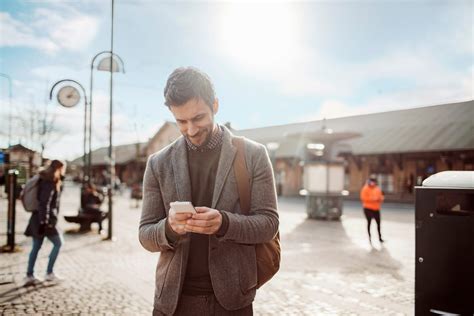 Businessman Using Mobile Phone Expatgo