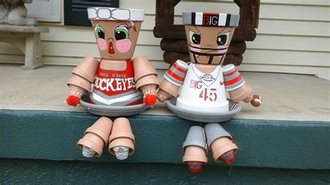 Choose a large flower pot with drainage holes. Ohio State clay pot people I have found that hot glue ...