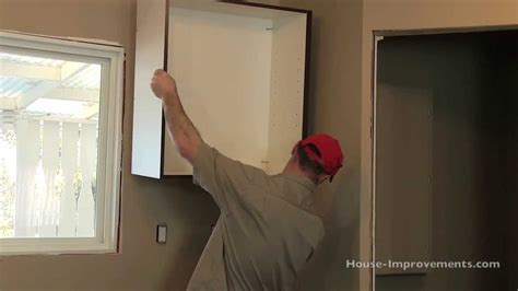 Is it possible to hang the drywall on the kitchen cabinets, and how to fix them. How To Install Kitchen Cabinets - YouTube