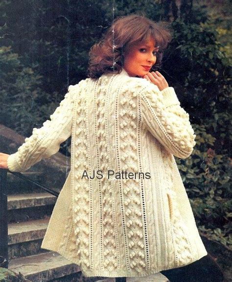 this pdf knitting pattern is for this lovely ladies edge to edge aran coat jacket with a