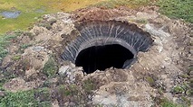 Mysterious sinkhole: Giant 30 meter-wide hole in Russia found by ...