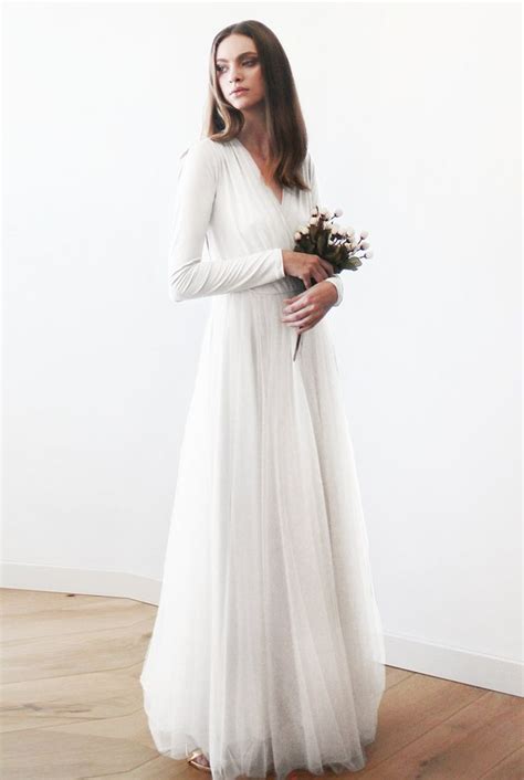 Dillard's is the destination for long sleeve women's wedding guest dresses. 50 Beautiful Long Sleeve Wedding Dresses - Stillwhite Blog ...
