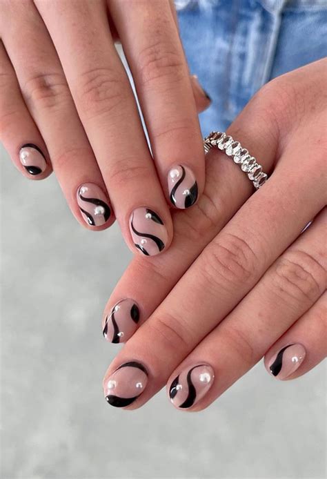32 Prettiest Autumn 2022 Nail Trends To Try Now Black Swirl Pearl Nails