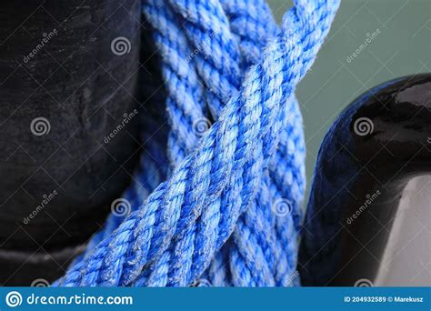 The Mooring Bollard With Blue Ropes On It Stock Image Image Of