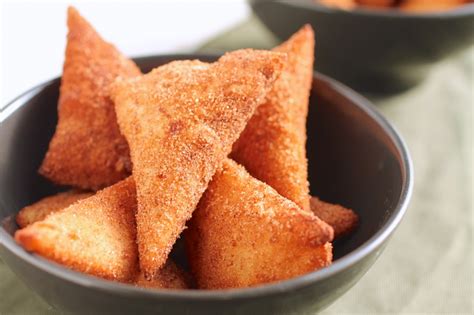 Place warm bunuelos in a paper bag and shake with cinnamon sugar. cinnamon sugar tortilla fried