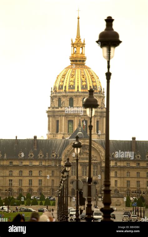The Golden Roof Of Eglise Du Dome Stands As A Landmark Above Hotel Des
