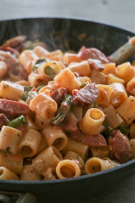 Add sausage, onions, and bell peppers and cook until lightly browned about 4 minutes. Smoked Sausage Asparagus Pasta | Sausage asparagus recipe ...