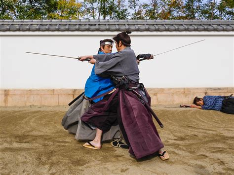 Two Samurai In Duel With A Sword Ready To Attack Japan Kyoto A