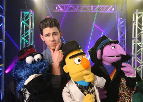 6 Celebrities Singing Their Way To Sesame Street On Hbo Photos