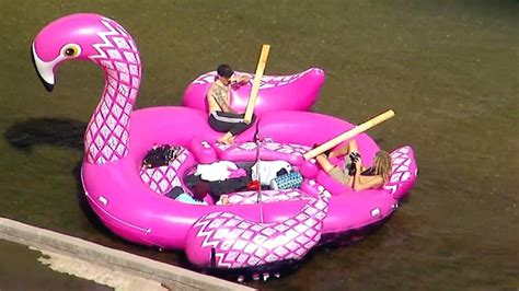 Joogsquad Group Floats Down River In Inflatable Pink Flamingo Raft In