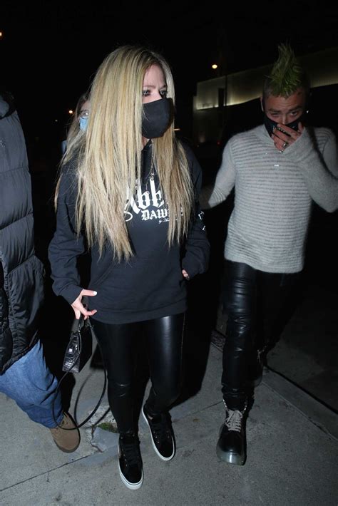 Avril Lavigne In A Black Outfit Arrives At Boa Steakhouse With Mod Sun For A Dinner In West