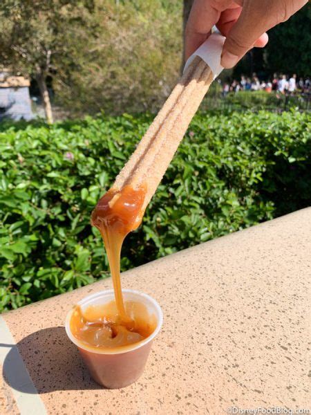 Review Go Nuts Over The New Caramel And Coconut Churros In Disneyland
