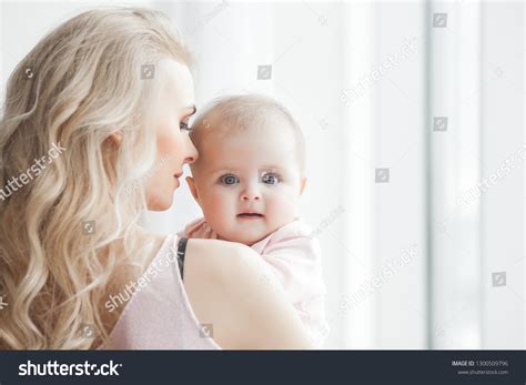 Young Mother Taking Care Her Little Stock Photo 1300509796 Shutterstock