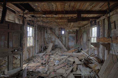 Very Decayed Back Room Of An Abandoned Farm House In Rural New
