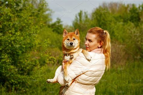 Girl Holds A Shiba Inu High Quality Animal Stock Photos ~ Creative Market