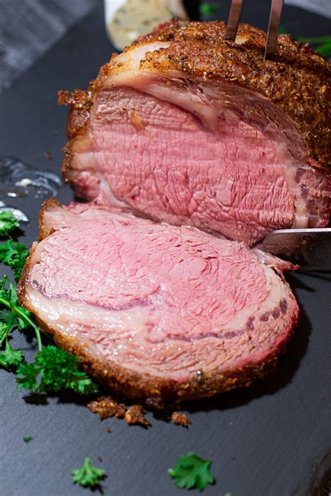 A full prime rib roast is comprised of seven (7) ribs starting from the shoulder (chuck) down the back to the loin, close to 15 to 18 pounds, and estimate a smoking time of 30 minutes per pound of meat. Smoked Prime Rib with Herb Compound Butter - Recipes Worth ...