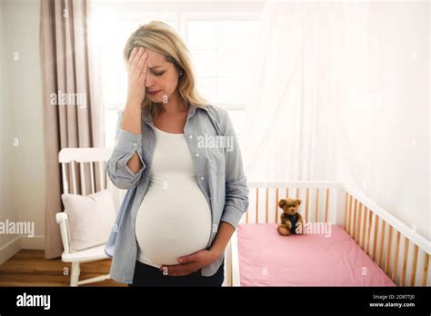 Pregnant Woman With A Lot Of Stress At Home Stock Photo Alamy