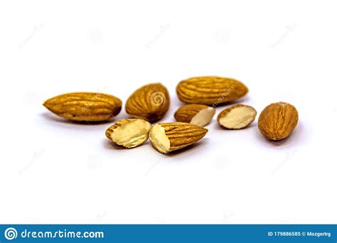 A Close Up Of Almond Seeds On White Isolated Background Food And