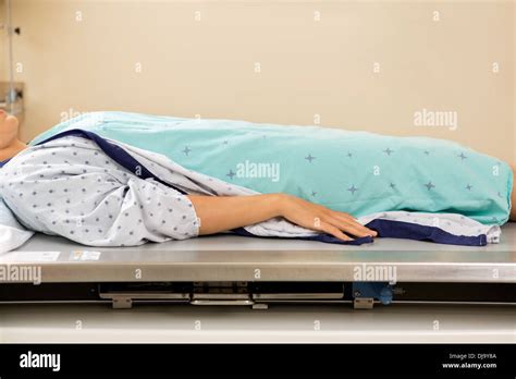 Patient Lying On Xray Table Stock Photo Alamy