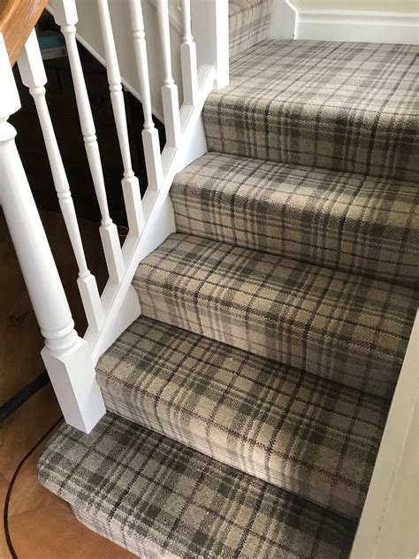 Grey Striped Carpet Runner On Stairs With Whipped Bound Edges