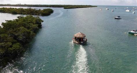 rent a floating tiki bar from cruisin tikis key west in florida