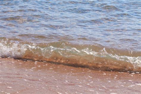 Sandy Beach And Blue Sea Wave Beautiful Natural Background Stock Photo