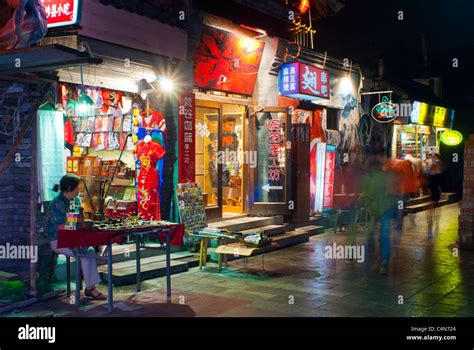 Beijing China Chinese Shops On Shopping Street Scene At Night Stock