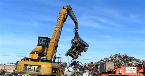 Lower scrap prices fill salvage yards, reduce recycling