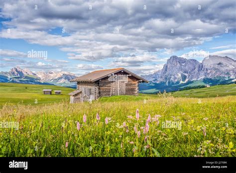 Idyllic Alpine Mountain Scenery In The Dolomites With Traditional Old