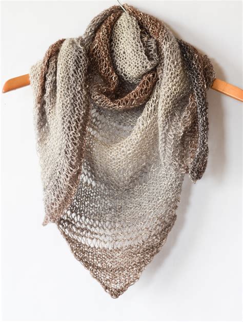 Want to learn how to knit such a thing? How To Knit An Easy Triangle Wrap - Mama In A Stitch