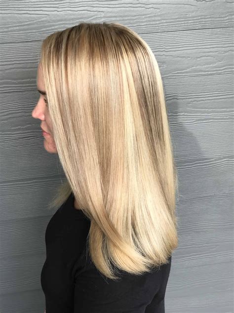 Adding blonde highlights is the perfect way to lighten. Tampa Hair Color & Highlights | The Grand Beauty Spa