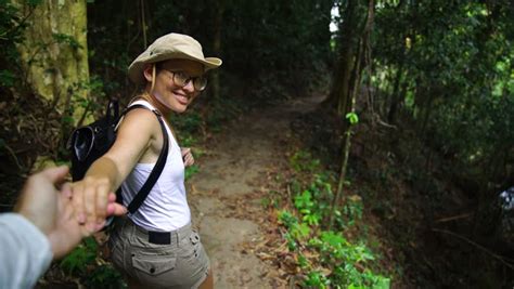 Hikers Walking In Forest Jungle Hiking Girl Trekking Through Dense Rainforest Healthy Young