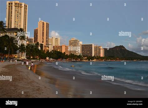 Dusk Approaches Waikiki Beach In In Hawaii Stock Photo Alamy