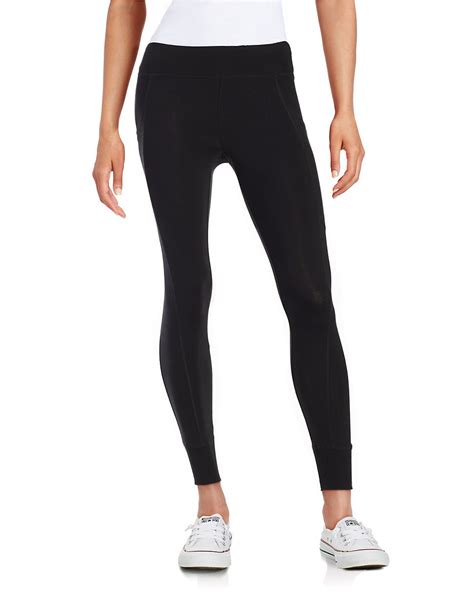 calvin klein cotton stretch jogger leggings in black lyst