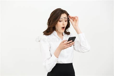 Business Concept Surprised Youngwoman Holding Mobile Phone And Staring
