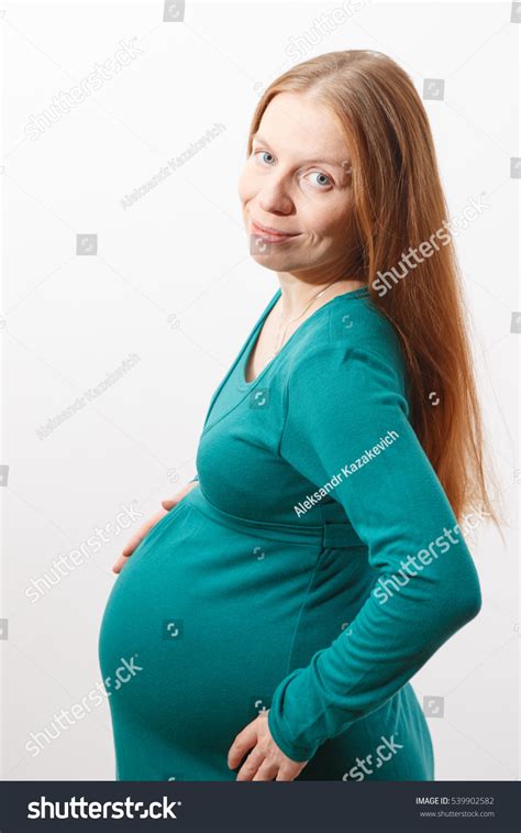 Pregnant Redhead Woman Her Big Belly Shutterstock