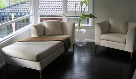 Pine wooden floorboards half treated with finney's white wood dye (diluted on a 1:2 ratio) in a london victorian terrace living room. Cypress Pine flooring that we stained black and coated in ...