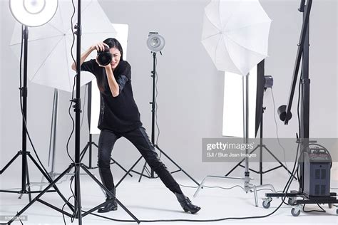 Photographer Taking Picture In Studio Photo Getty Images