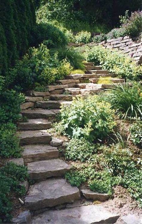 Red mulch accents a flower bed to the right. 12 Stone Step Path | Balcony Garden Web