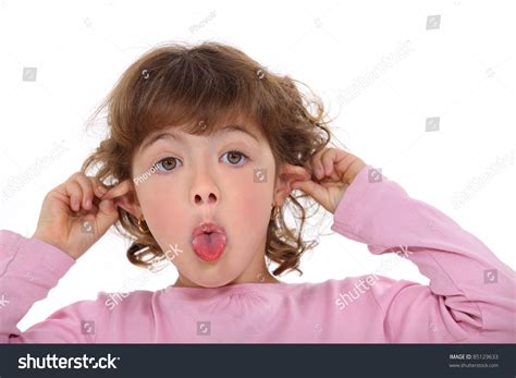 Young Girl Making A Funny Face Stock Photo 85129633