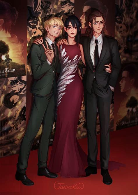 Three People Standing Next To Each Other In Front Of A Red Carpeted