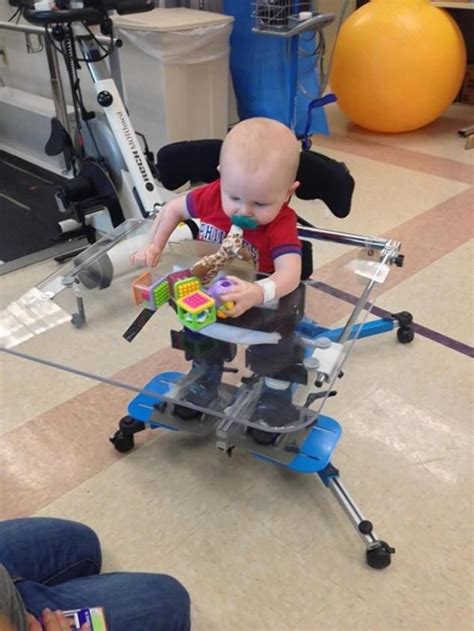 Video Paralyzed 1 Year Old Boy Learns To Use Wheelchair For The First