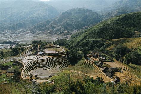 agricultural-terraces-and-buildings-in-beautiful-mountains,-sa-pa