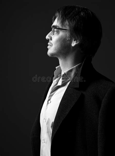 Black And White Profile Of Strong Self Confident Man In White Shirt And