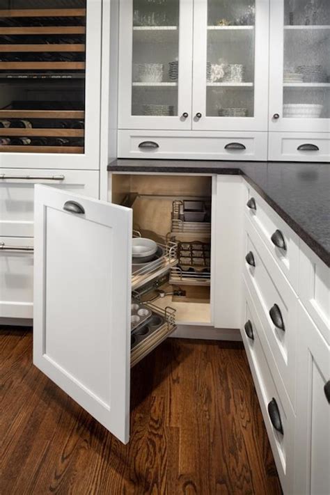 This deep cabinet has been so disorganized and needed a serious storage solution. Swing Out Kitchen Cabinets - Transitional - kitchen ...